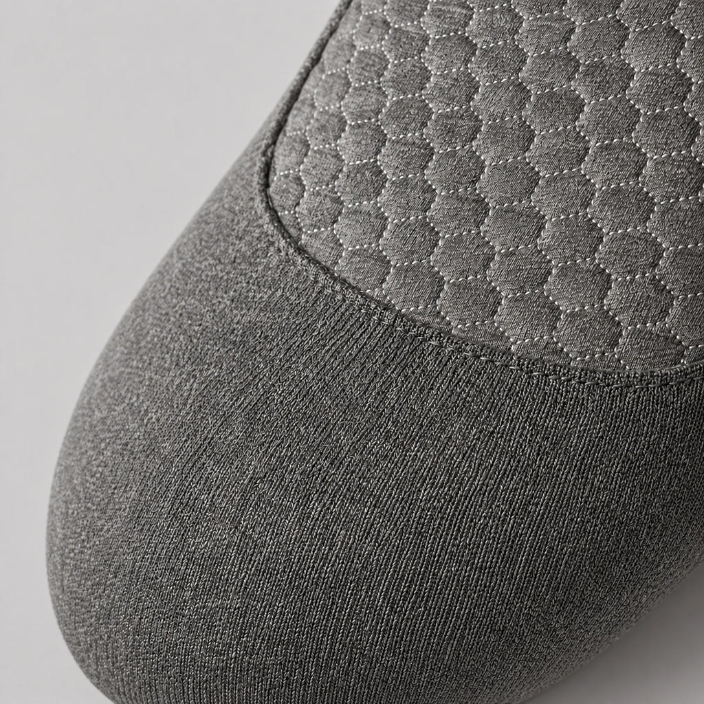 Close view of the honeycomb quilted panel and knitted grey cover