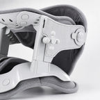 Close-up of the adjustable side traction dial used to raise the front support