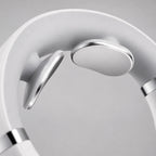 Close view of the two metal electrode pads that rest against the back of the neck