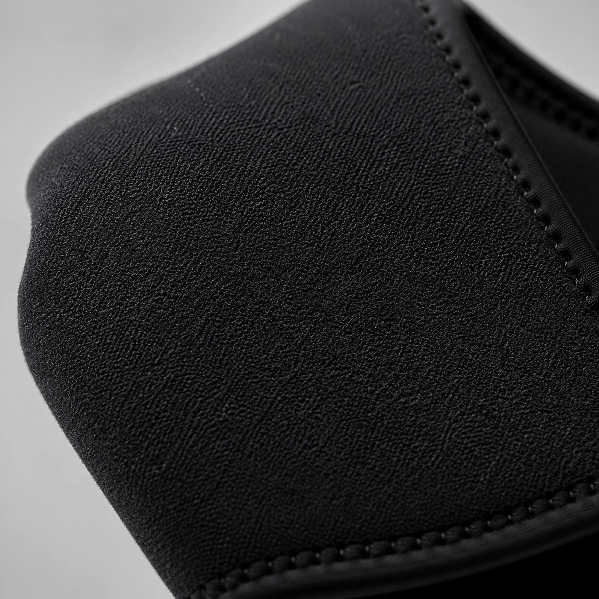 Close view of the soft brushed fabric and stitched edge of the wrap