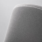 Extreme close-up of the calf massager wrap's fabric texture and stitched seam