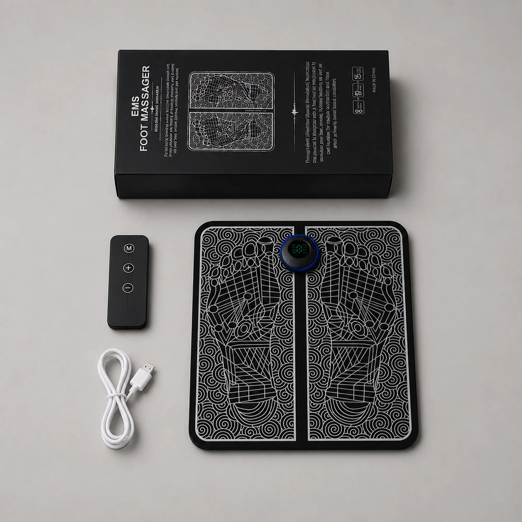 Box contents laid out: foot massager pad, wireless remote and USB charging cable