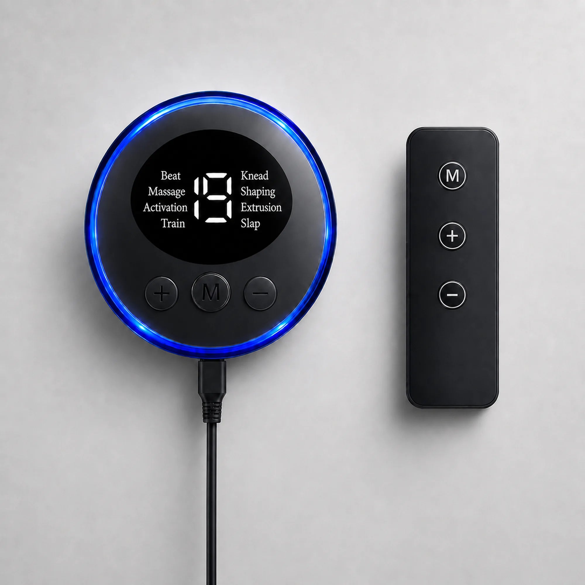 Close-up of the EMS foot massager control unit with white mode readout and wireless remote with M, plus and minus buttons